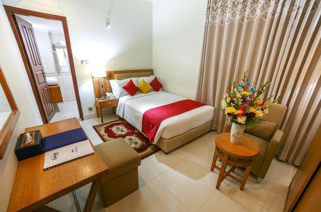 Nascent Gardenia Luxury Suites داكا الغرفة الصورة